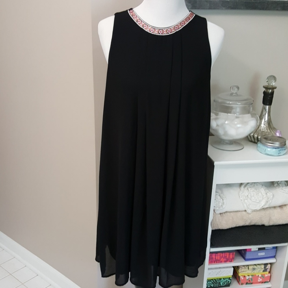 Easy to wear sleeveless free flowing mini
